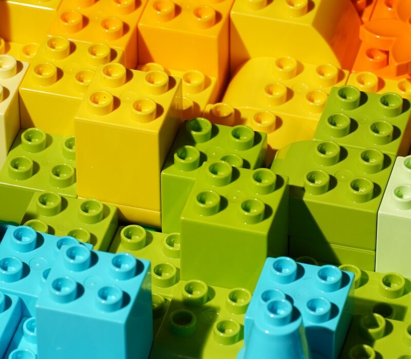 a close up of many different colored legos