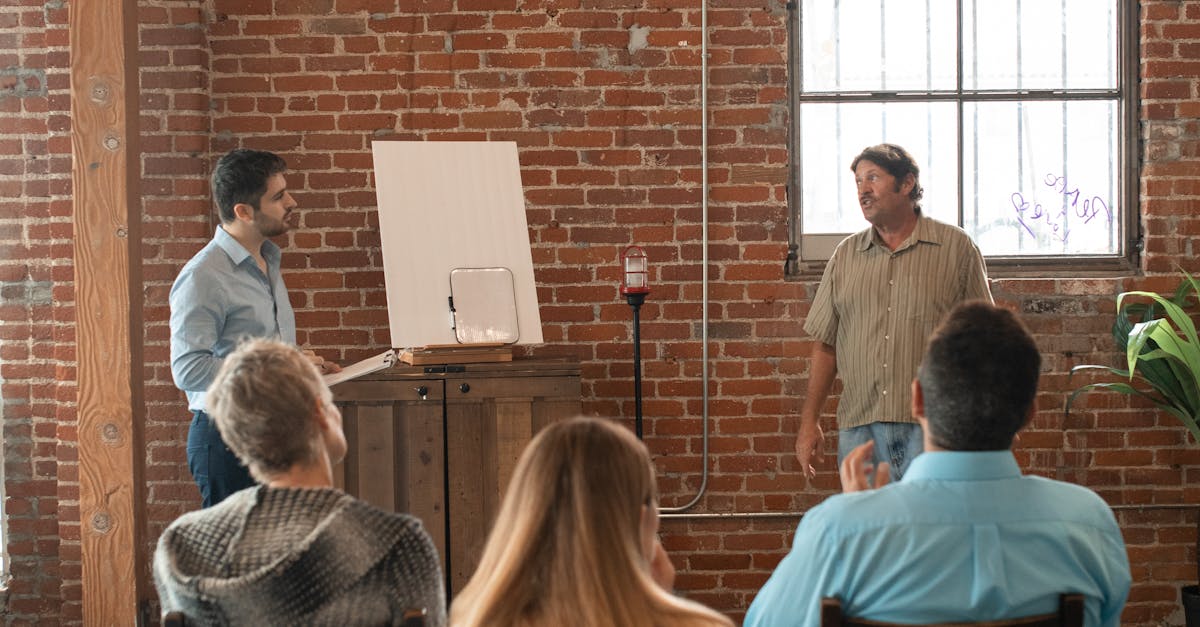 Adults attending a casual learning session in a rustic brick interior.